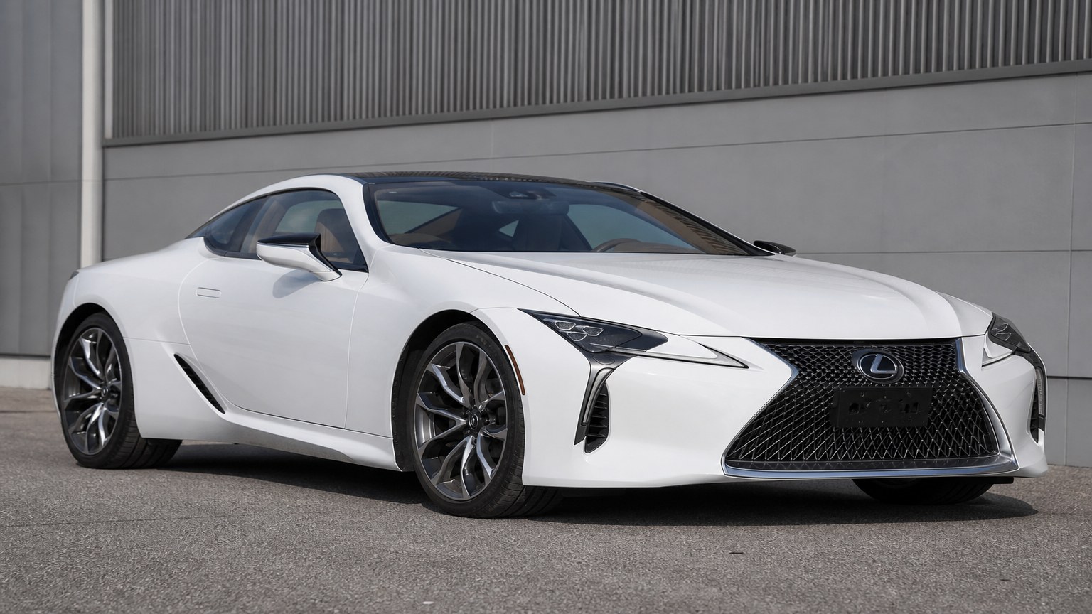 A higher-risk Lexus LC model year parked in a dealership lot.
