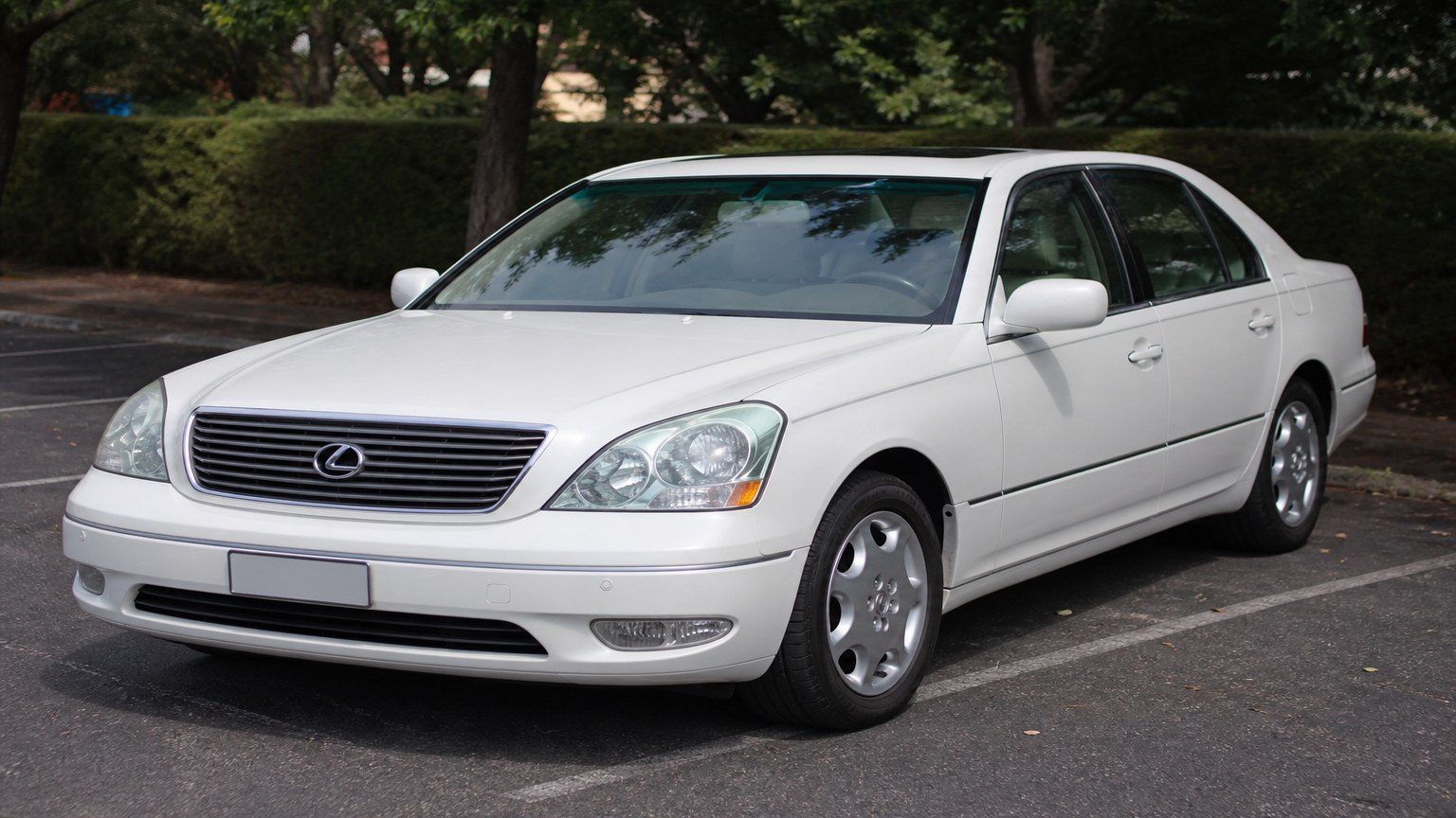 A higher-risk Lexus LS 430 model year parked in a dealership lot.