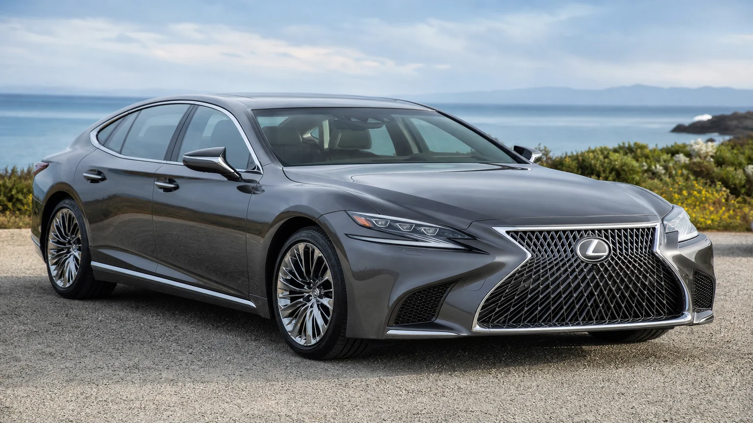 A Lexus LS 500 luxury sedan, three-quarter front view, parked on a quiet street.