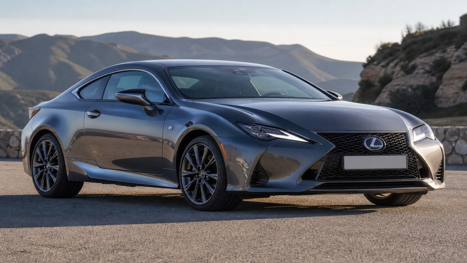 A cleaner later-model Lexus RC on a quiet road.