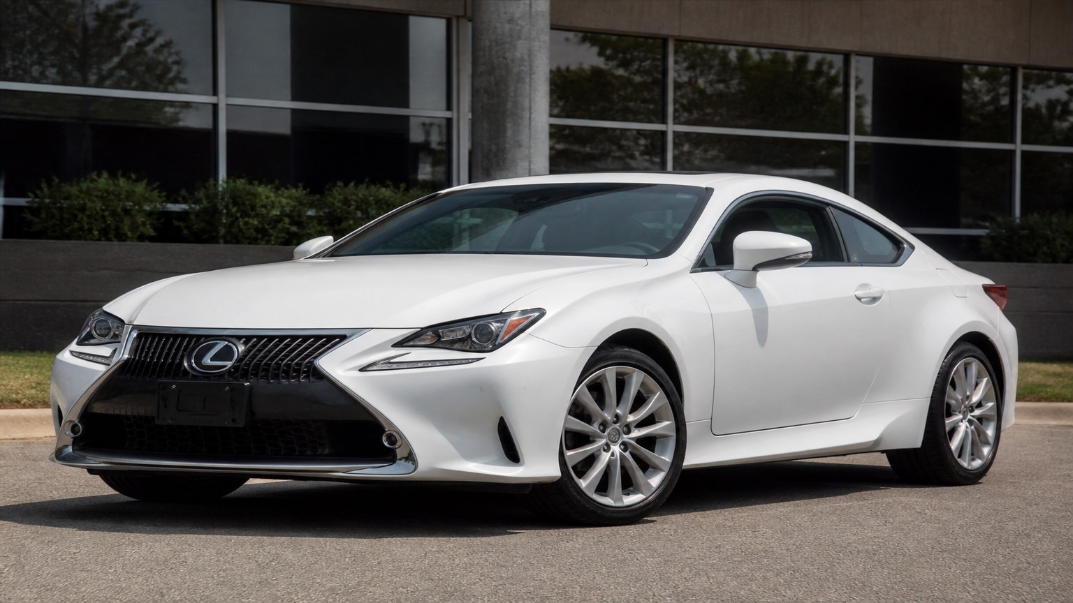 A higher-risk Lexus RC model year parked in a dealership lot.