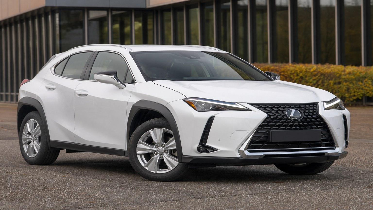 A higher-risk Lexus UX model year parked in a dealership lot.
