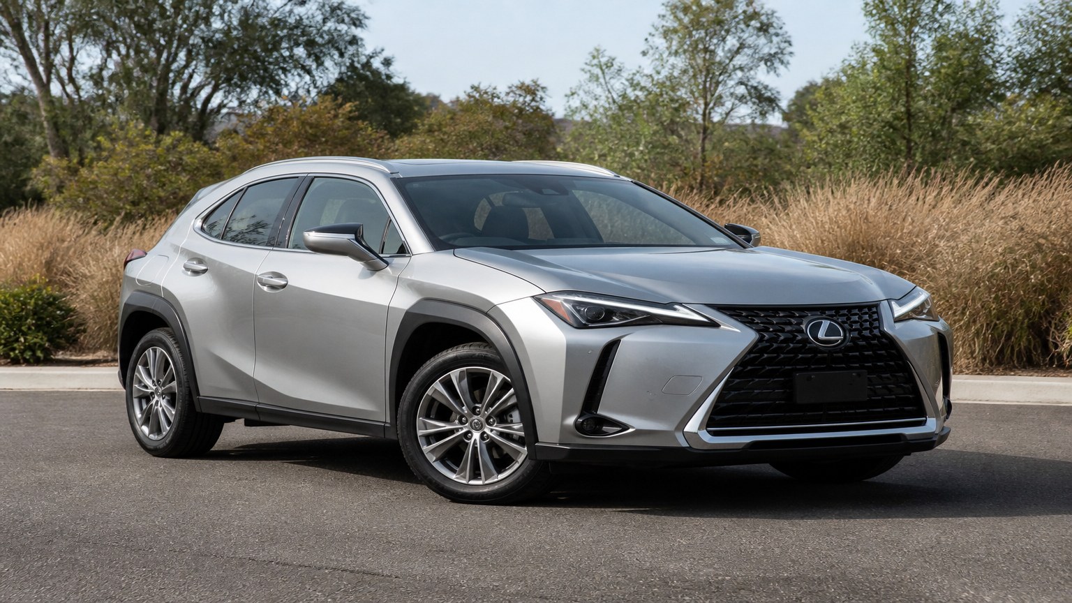 A Lexus UX parked outdoors, three-quarter front view.