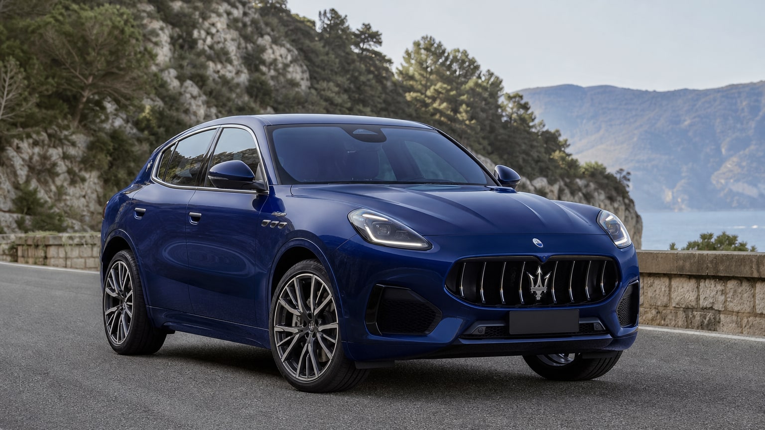 A cleaner later-model Maserati Grecale on a quiet road.