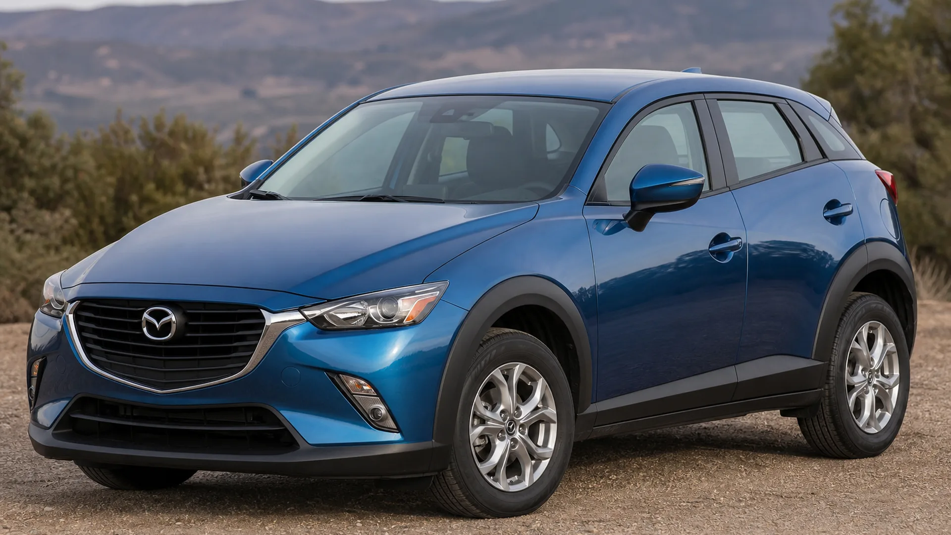 A Mazda CX 3 parked outdoors.