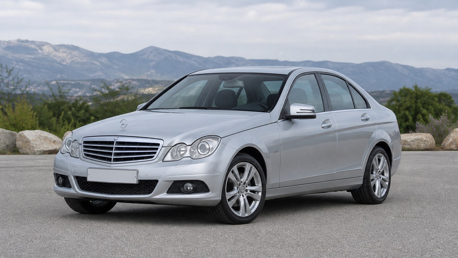 A higher-risk Mercedes-Benz C-Class model year parked in a dealership lot.