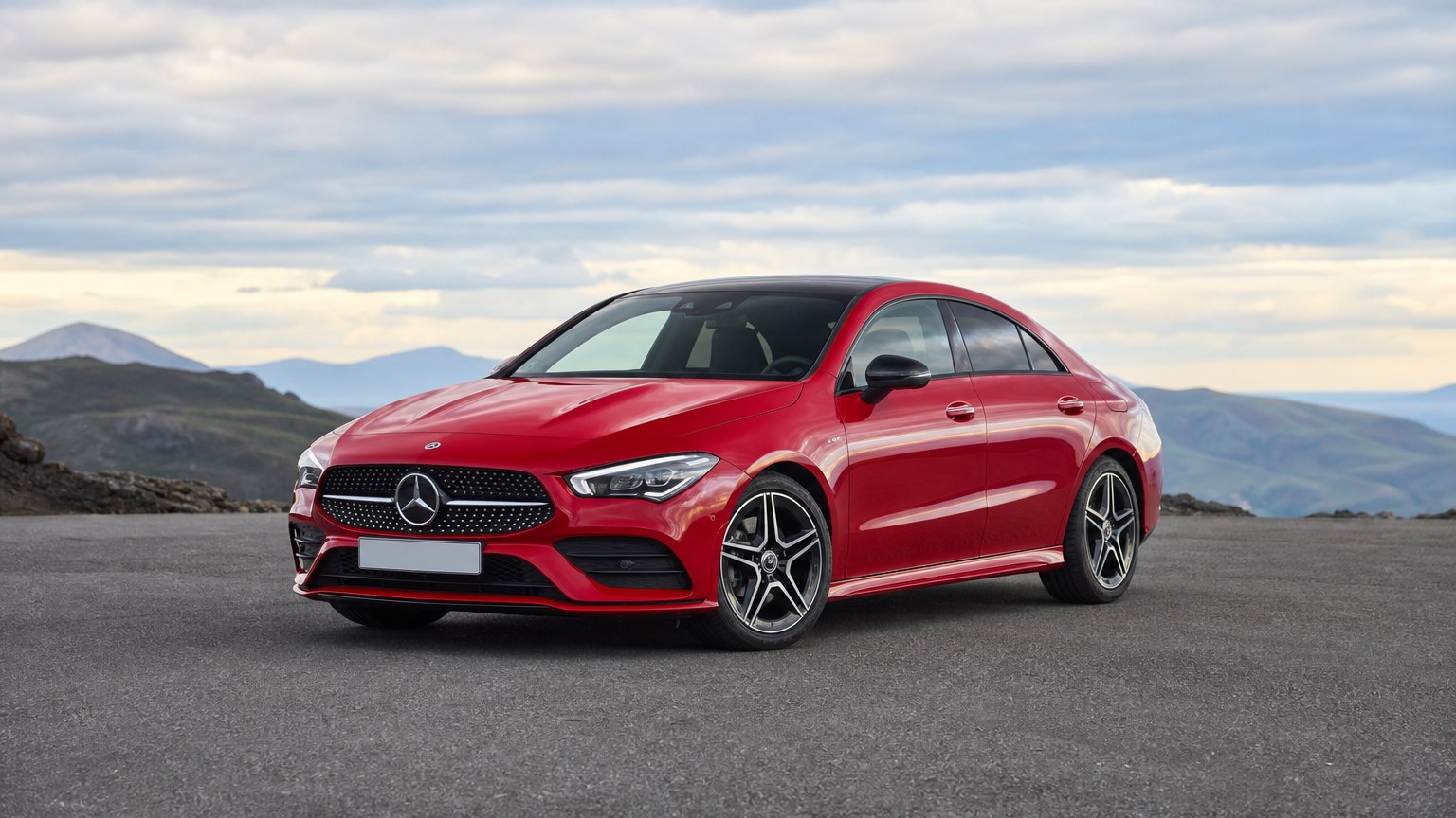A cleaner later-model Mercedes-Benz CLA on a quiet road.