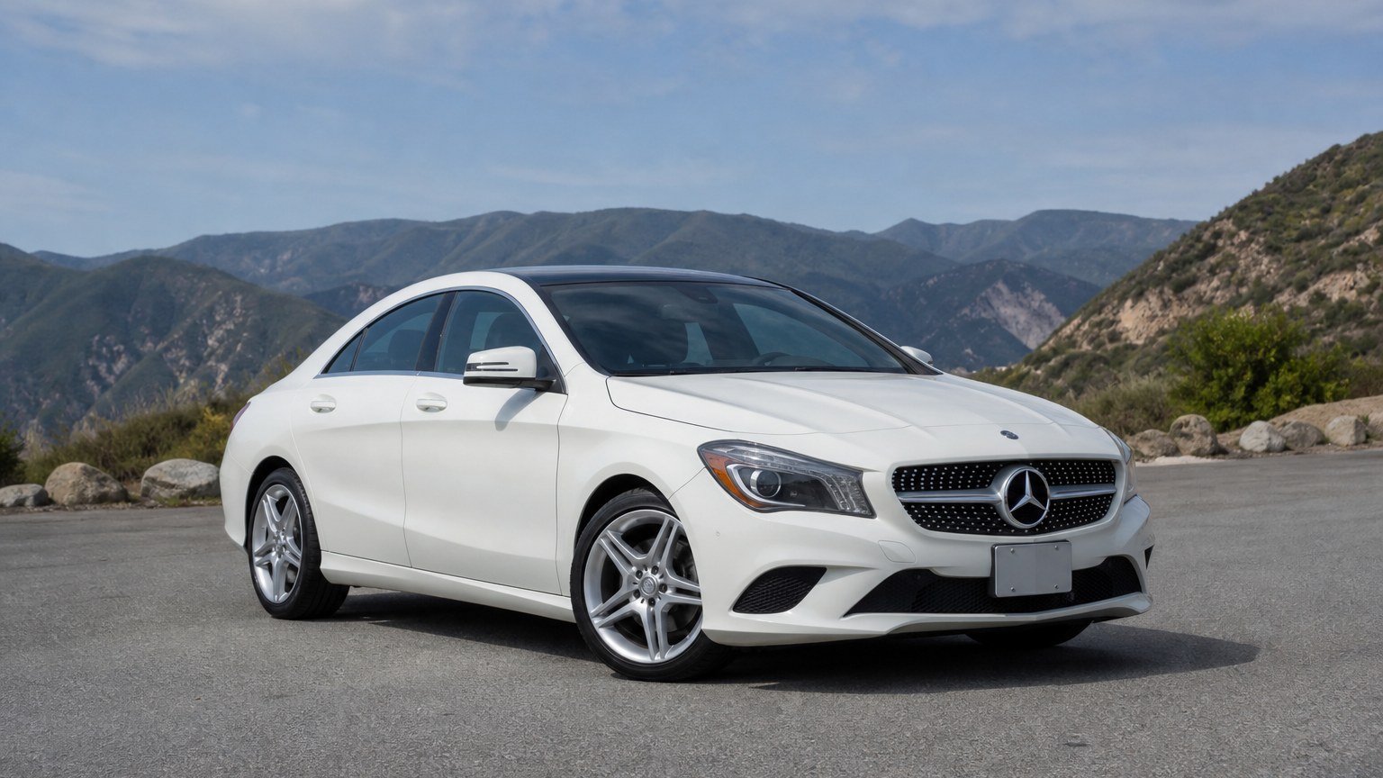 A higher-risk Mercedes-Benz CLA model year parked in a dealership lot.