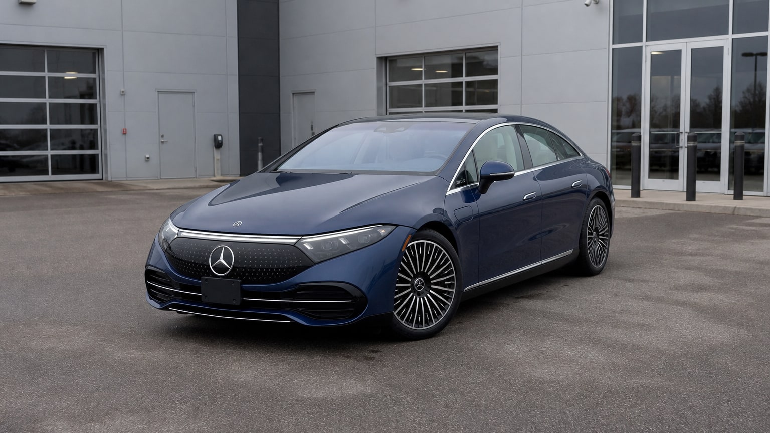 A higher-risk Mercedes-Benz EQS model year parked in a dealership lot.