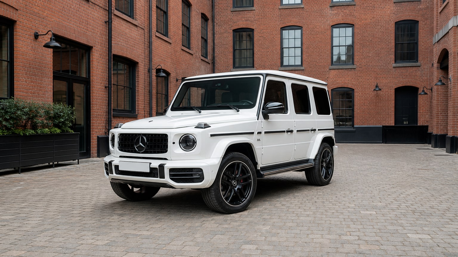 A Mercedes-Benz G-Class parked outdoors, three-quarter front view.