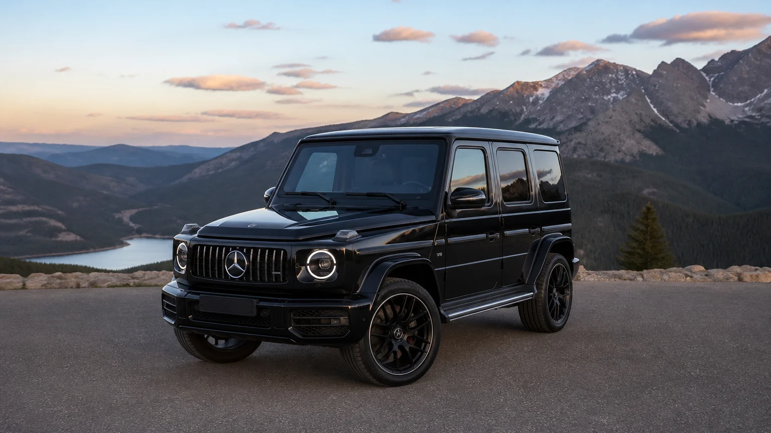 A Mercedes-Benz G-Class SUV, three-quarter front view, parked on a quiet street.