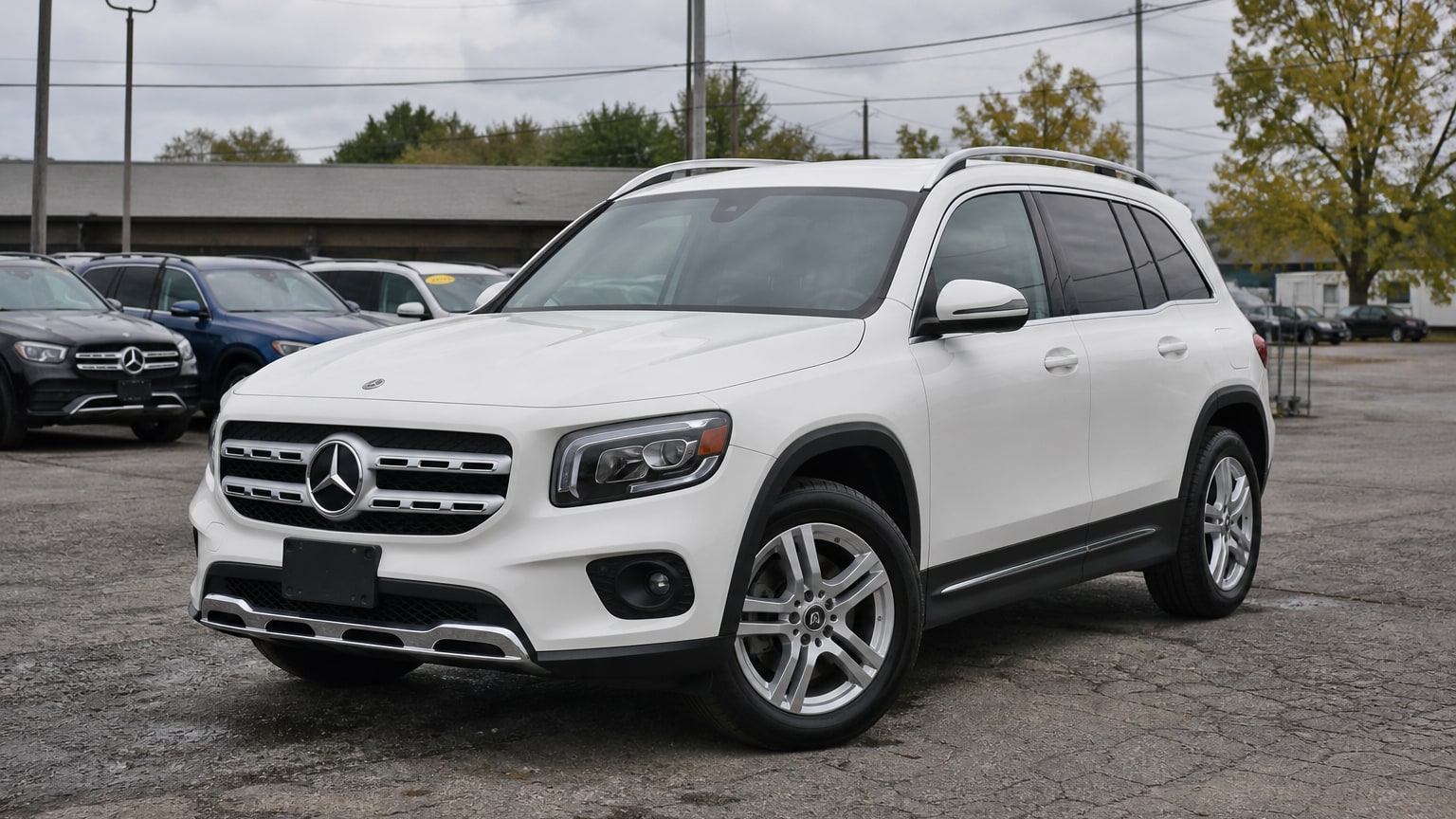 A higher-risk Mercedes-Benz GLB model year parked in a dealership lot.