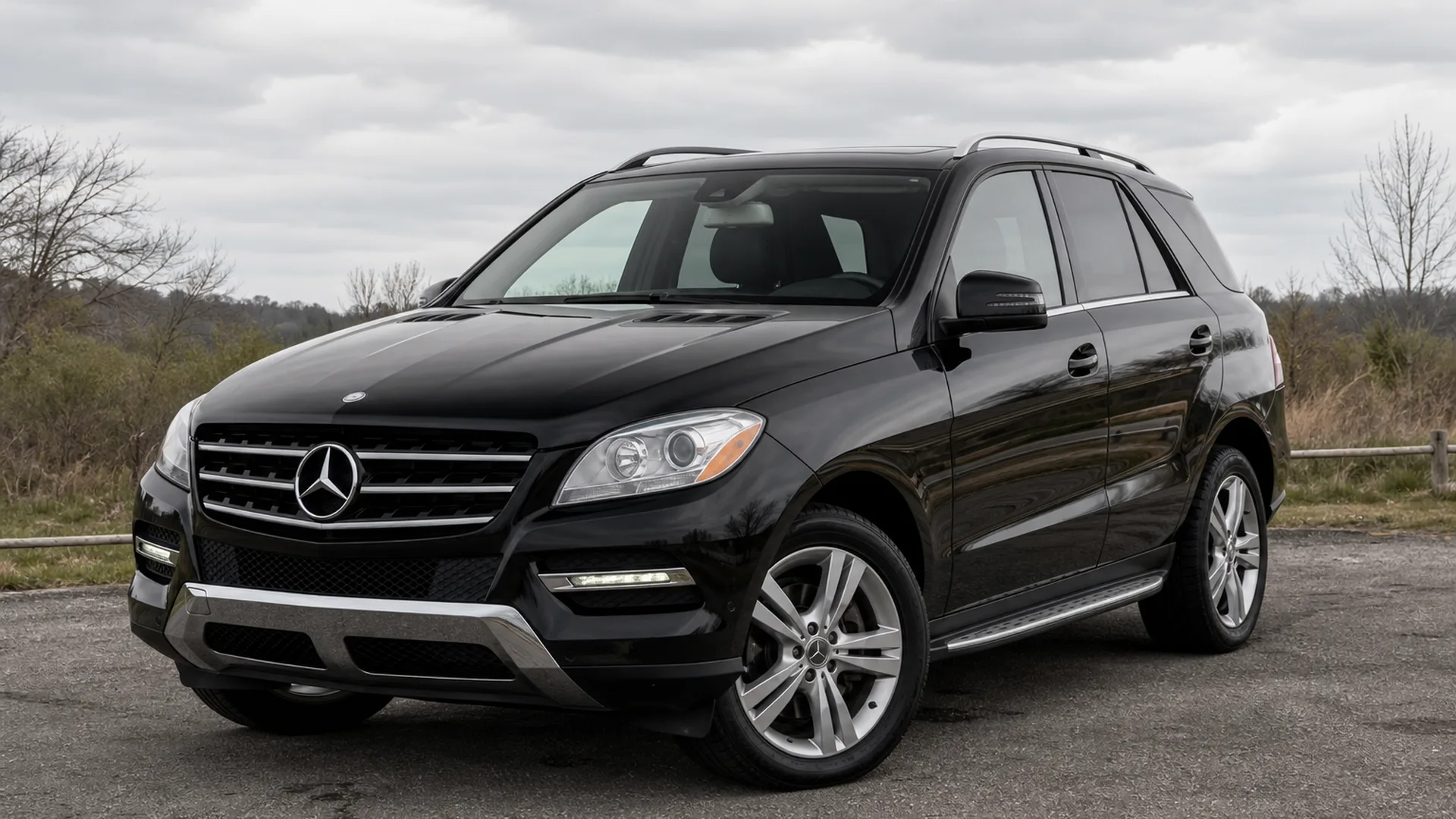 A Mercedes ML350 parked outdoors.