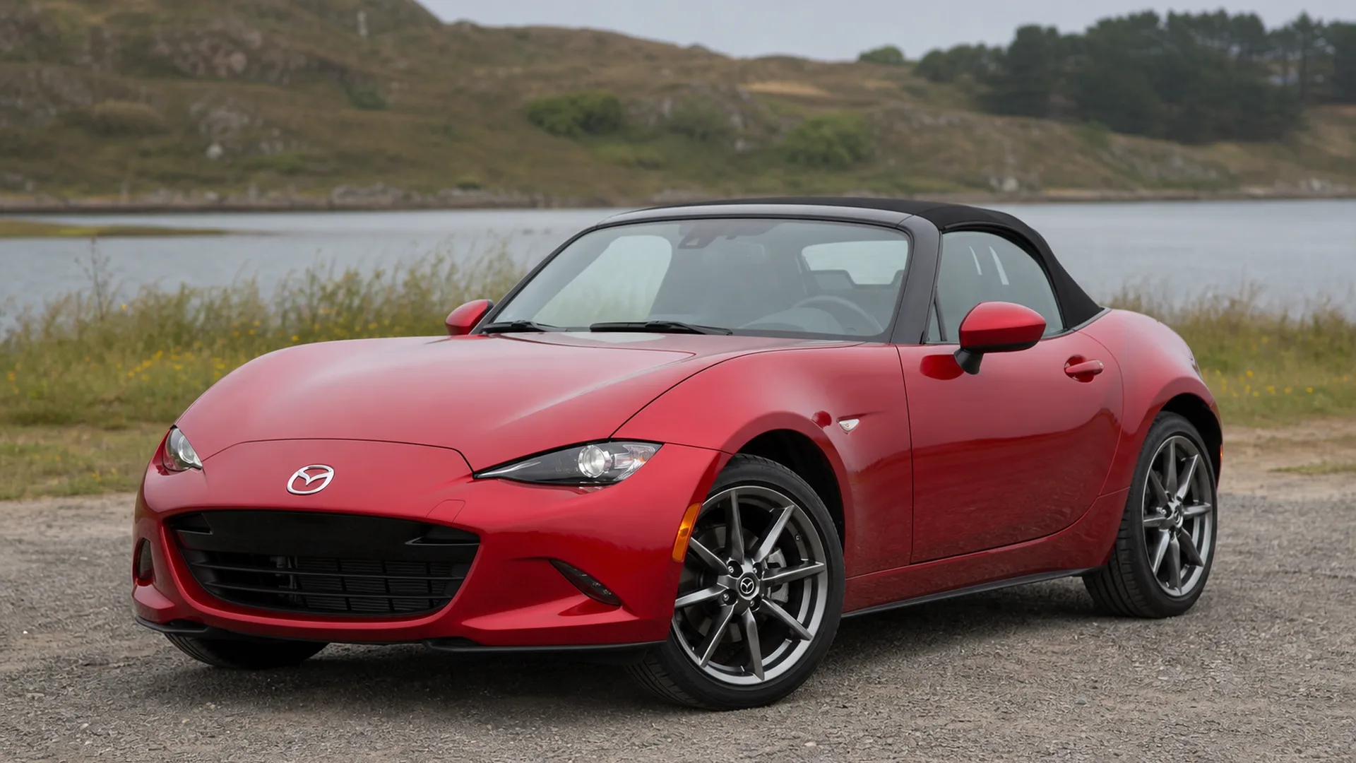 A Mazda Miata parked outdoors.