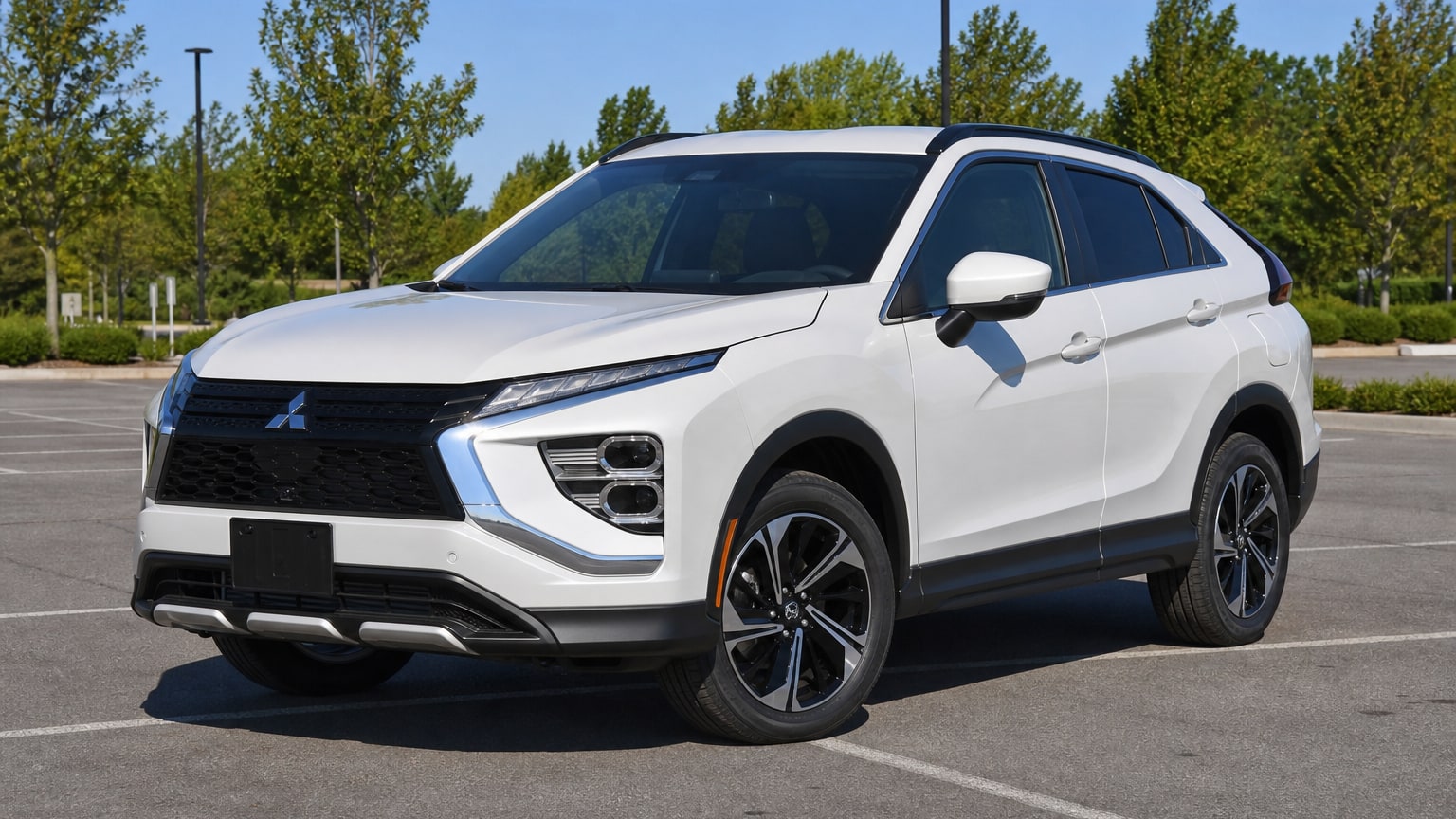 A cleaner later-model Mitsubishi Eclipse Cross on a quiet road.