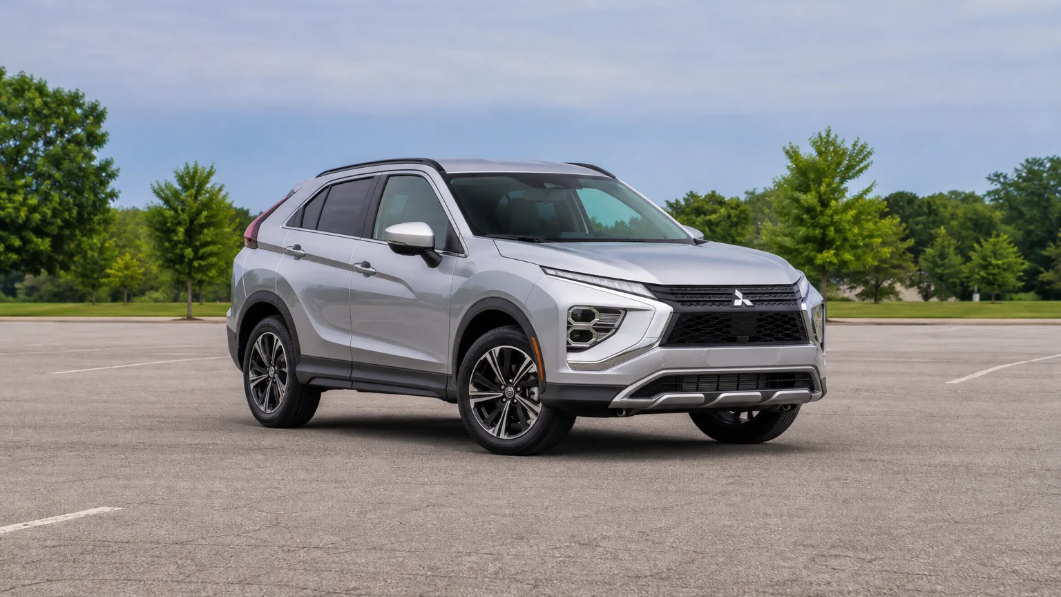 A Mitsubishi Eclipse Cross, three-quarter front view, parked outdoors.