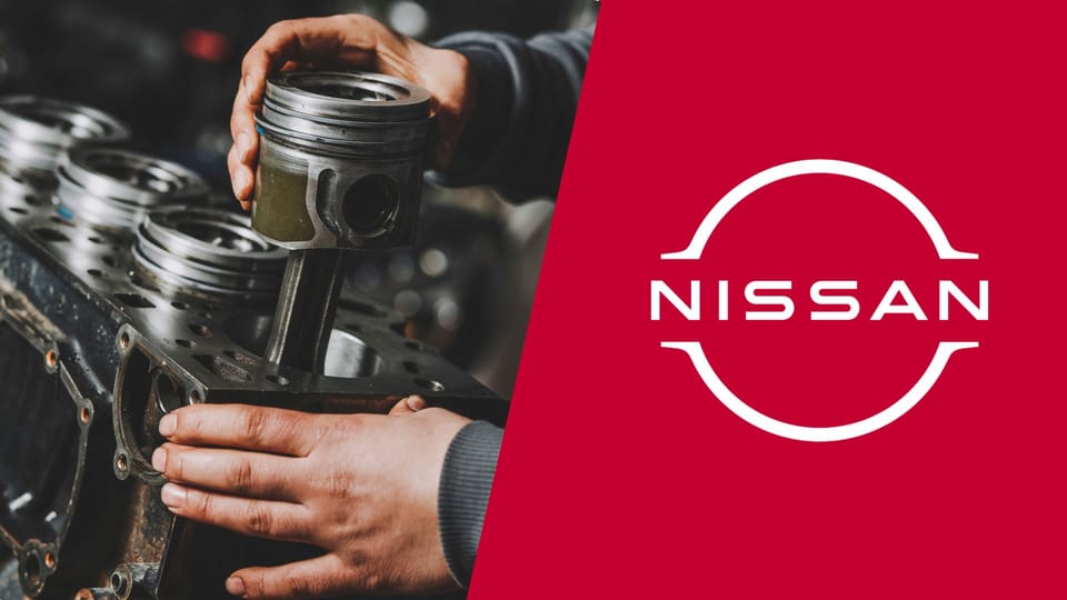 A man is working on a nissan engine.|A white tesla sports car with four numbers on it.|A white tesla sports car with four numbers on it.|A white tesla sports car with four numbers on it.|A white tesla sports car with four numbers on it.