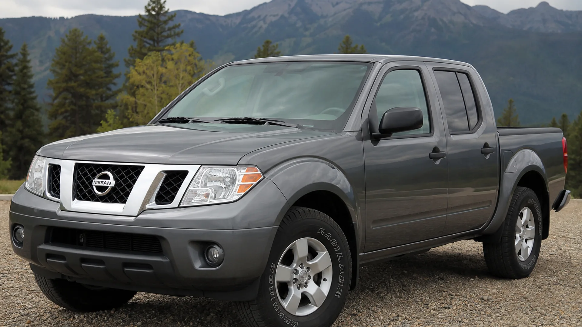 A Nissan Frontier parked outdoors.