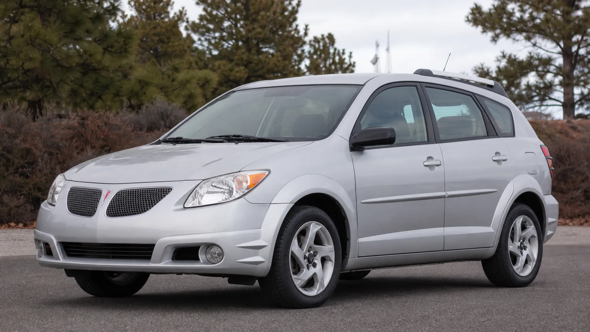 A Pontiac Vibe parked outdoors.