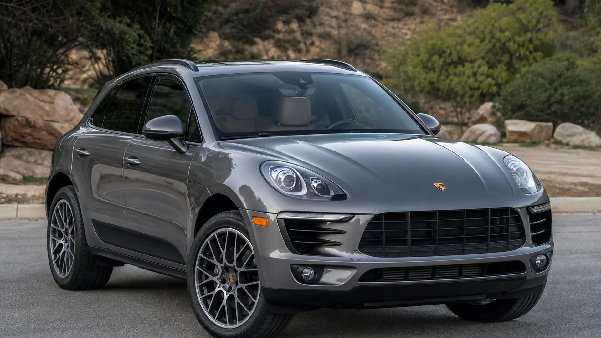 A Porsche Macan parked outdoors.