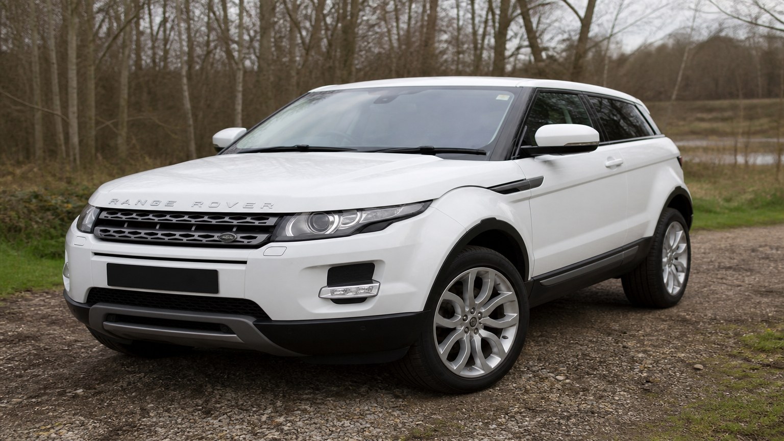 A higher-risk Range Rover Evoque model year parked in a dealership lot.