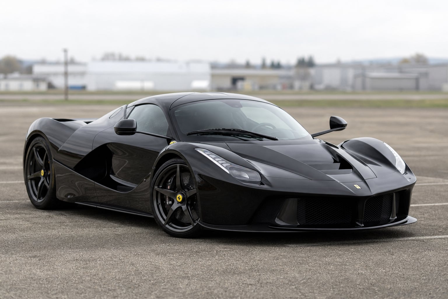 Black Ferrari LaFerrari parked in a parking lot