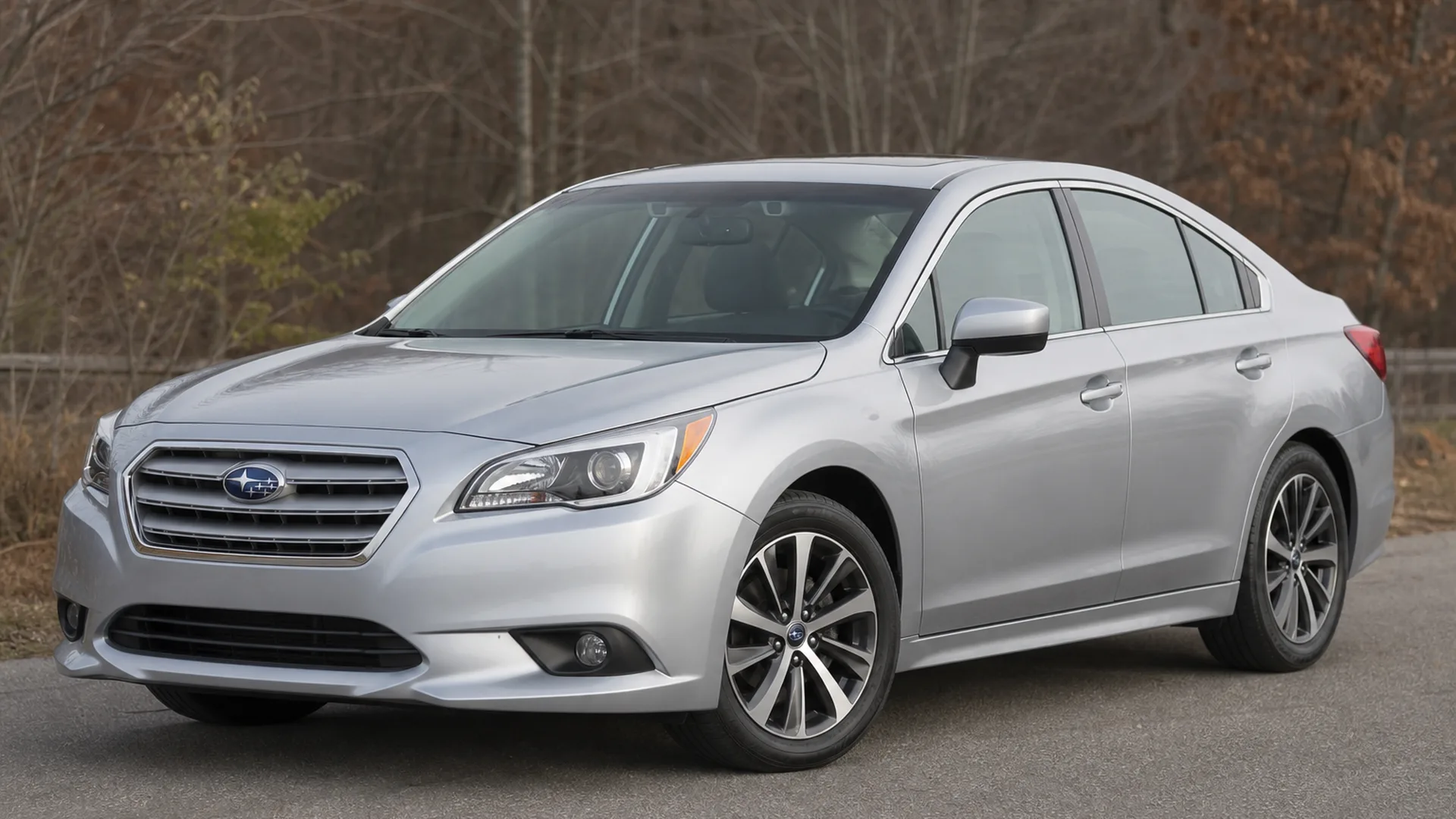 A Subaru Legacy parked outdoors.