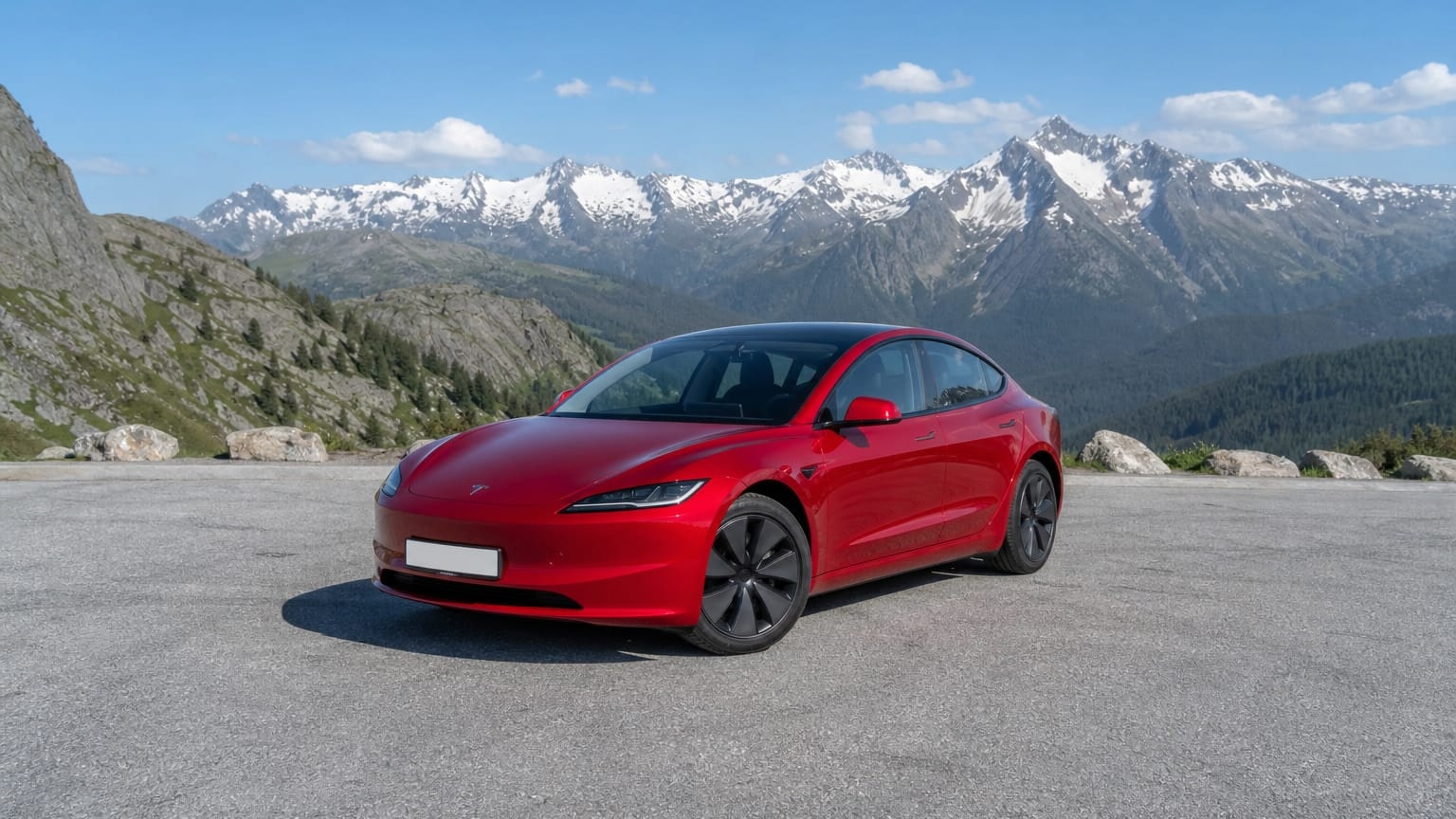 A cleaner later-model Tesla Model 3 on a quiet road.