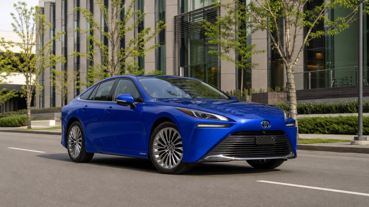 A Toyota Mirai parked outdoors, three-quarter front view.