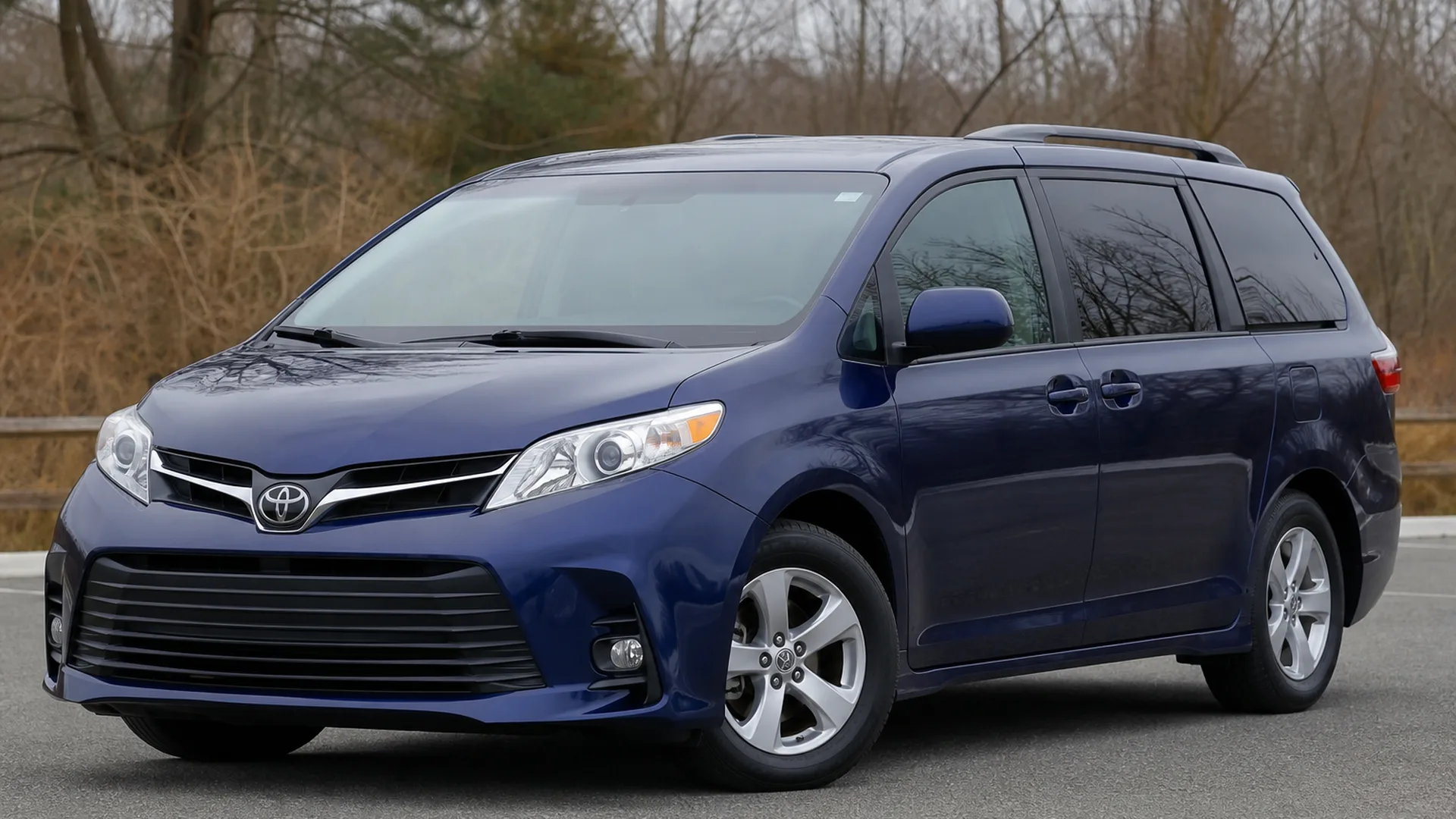 A Toyota Sienna parked outdoors.
