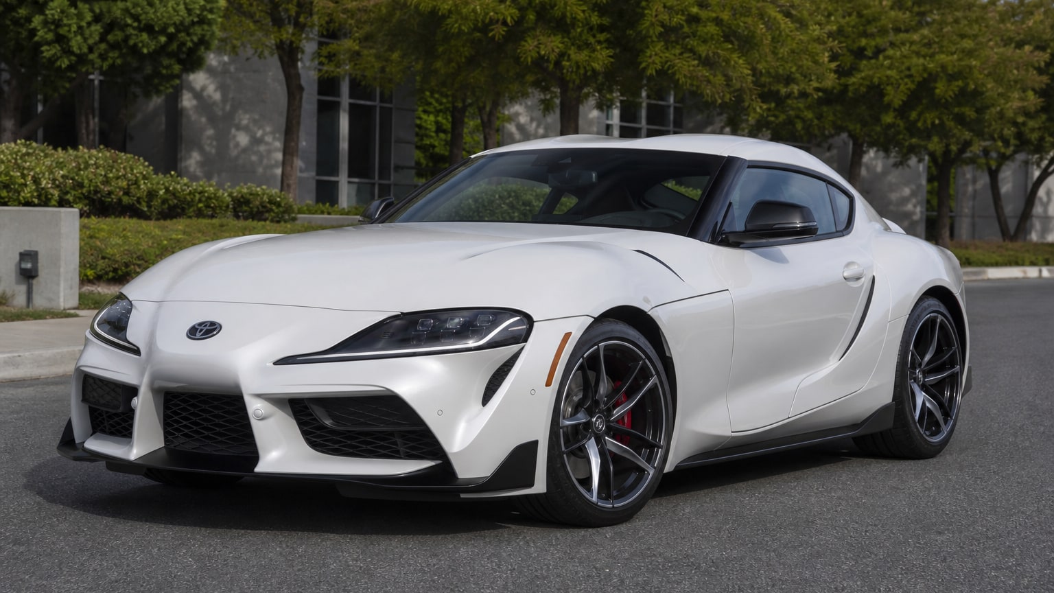 A higher-risk Toyota Supra model year parked in a dealership lot.