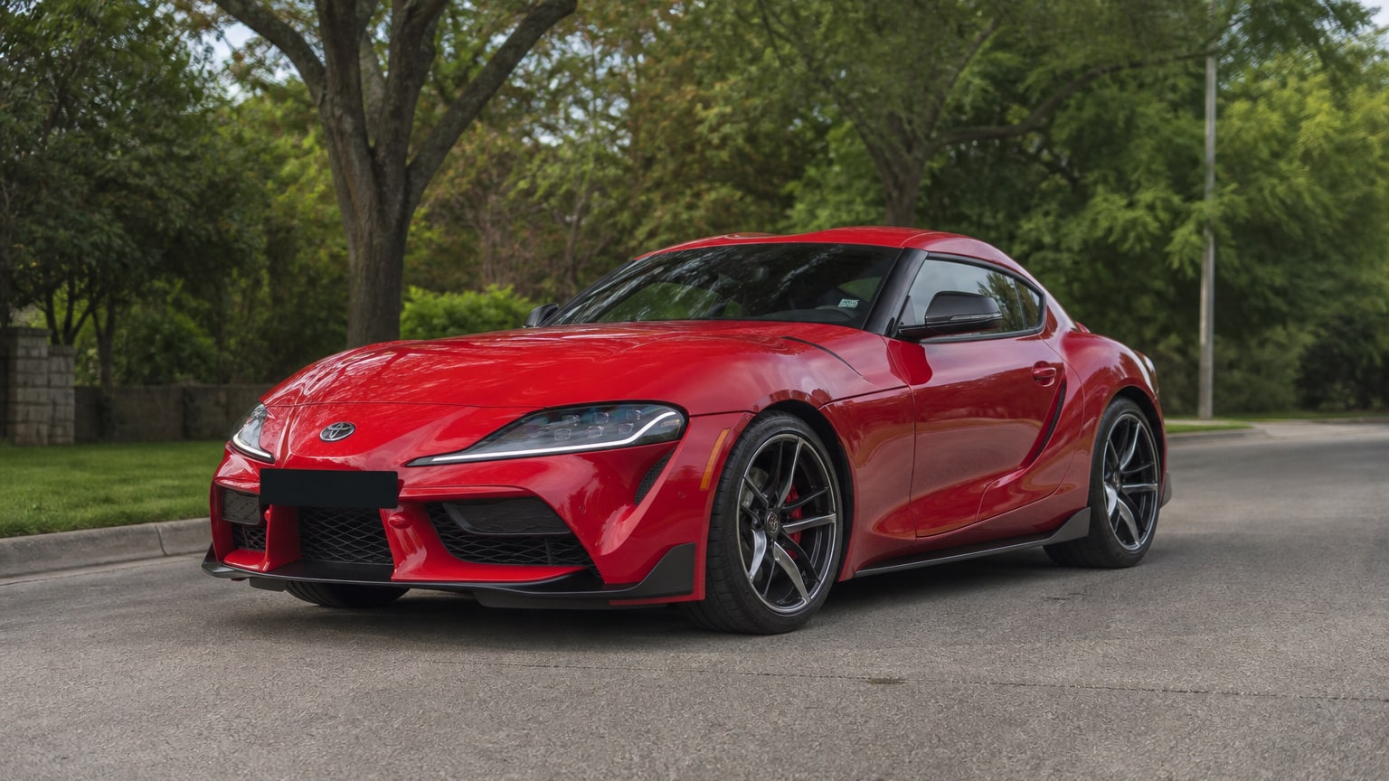 A Toyota Supra parked outdoors, three-quarter front view.