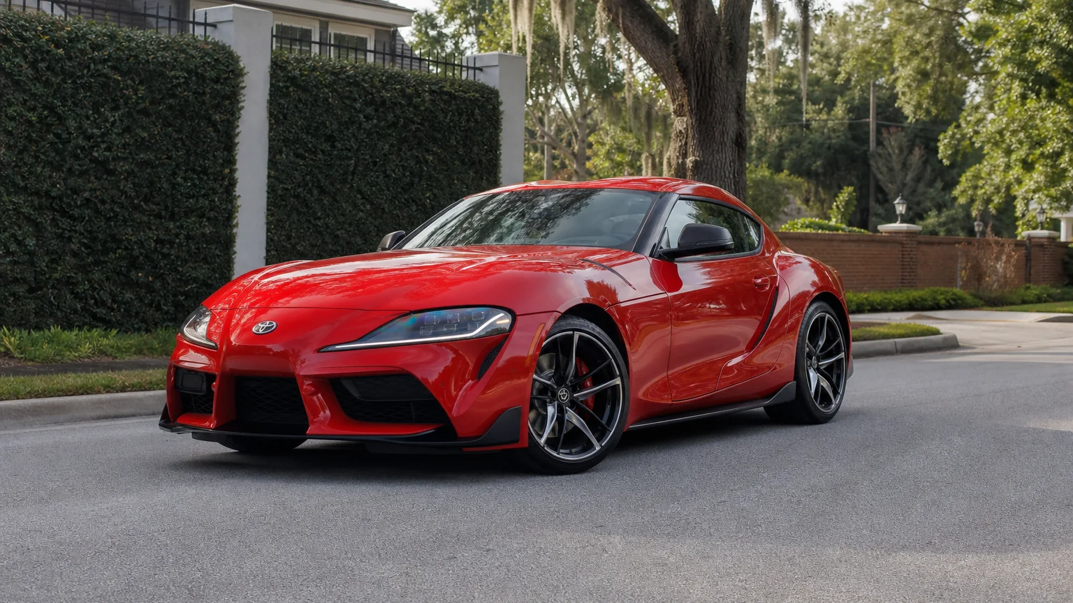 A Toyota Supra, three-quarter front view, parked outdoors.