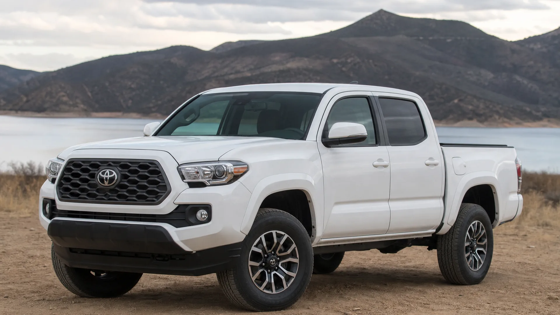 A white Toyota Tacoma pickup truck parked outdoors.