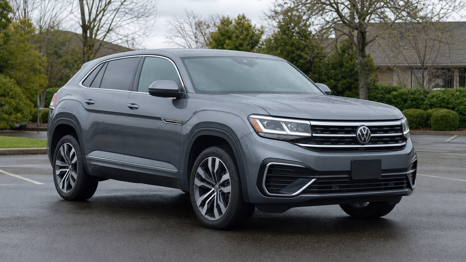A Volkswagen Atlas Cross Sport parked outdoors, three-quarter front view.
