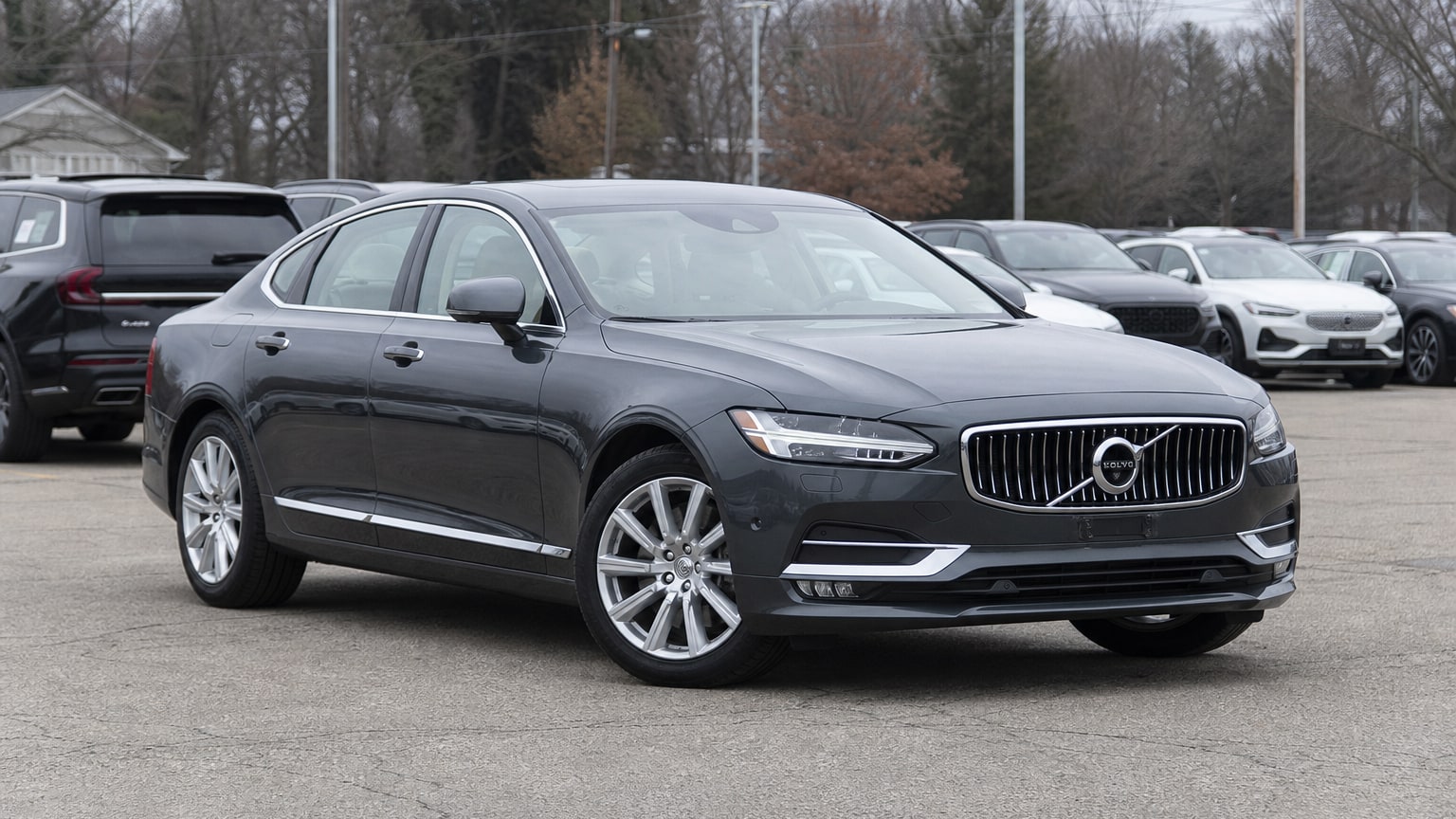 A higher-risk Volvo S90 model year parked in a dealership lot.