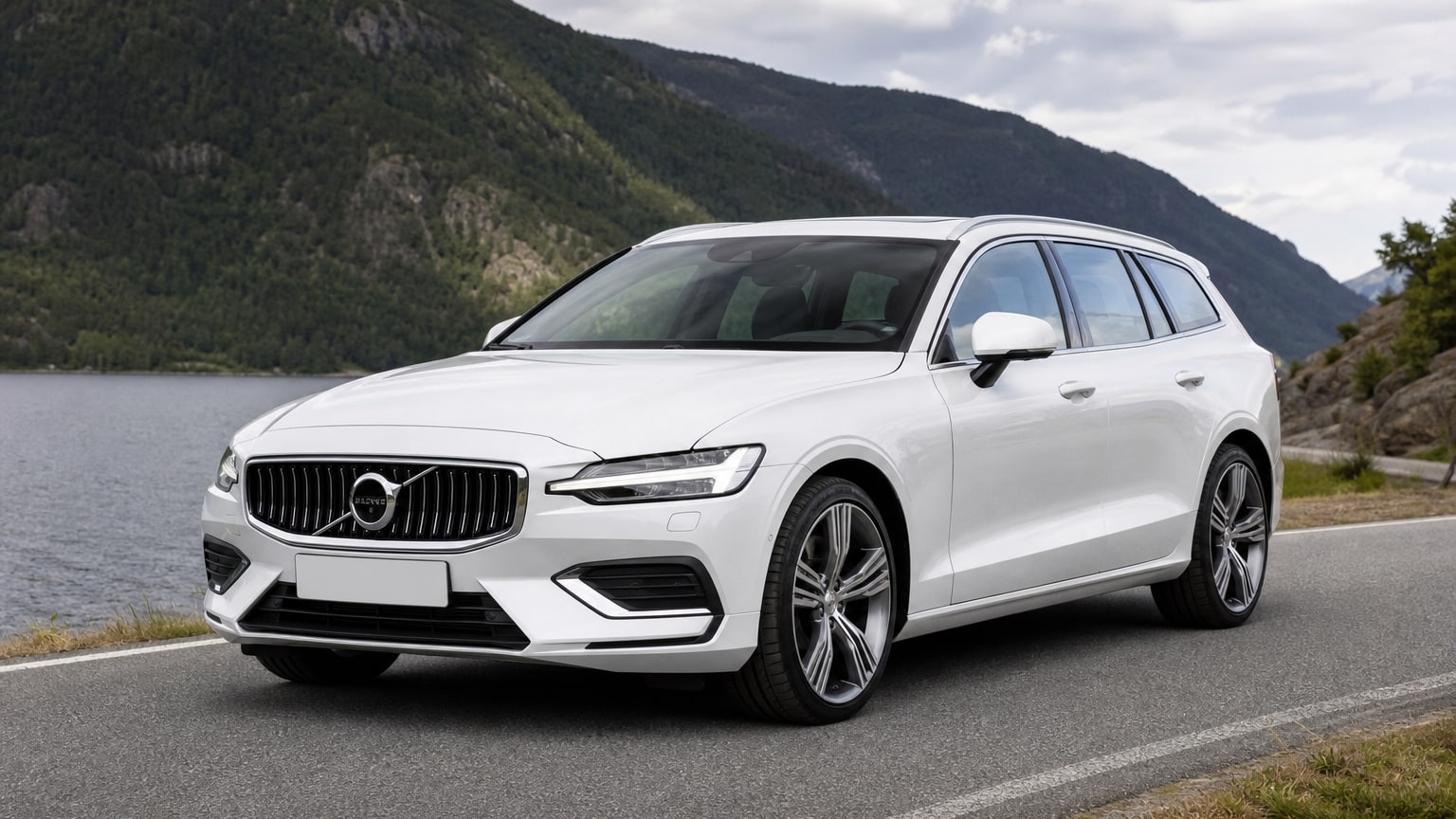 A cleaner later-model Volvo V60 on a quiet road.