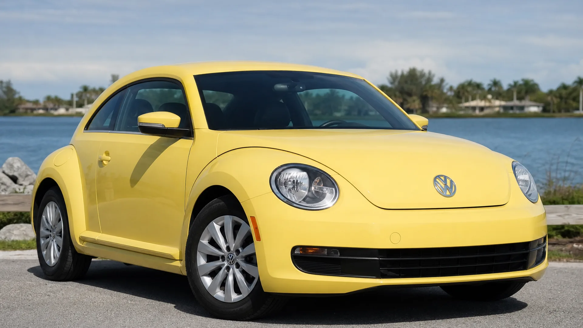 A VW Beetle parked outdoors.