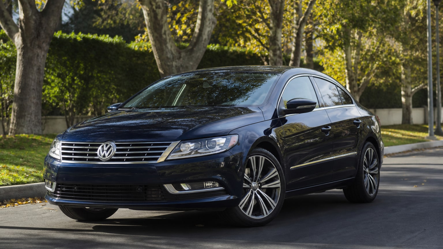 A late 2016–2017 Volkswagen CC on a tree-lined street.